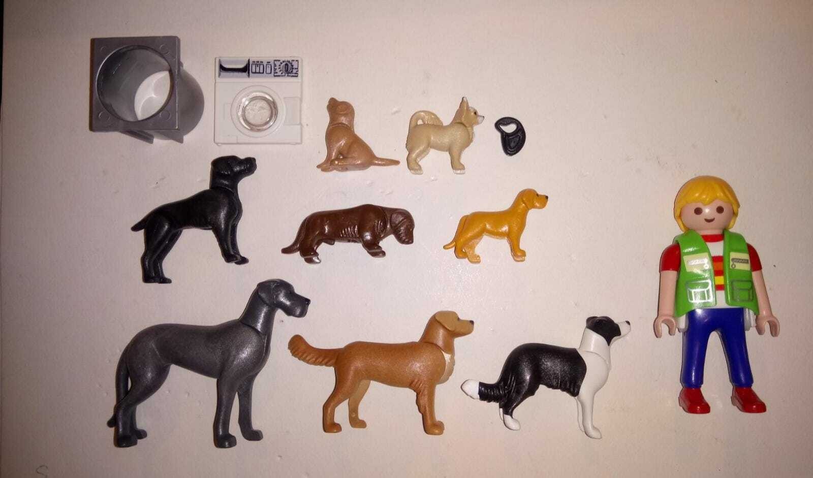 PLAYMOBIL ADIESTRADOR CON VARIOS PERROS EN BOLSA CERRADA
